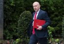 The UK cuts energy bills, taxes banks and boosts defense in high-stakes budget